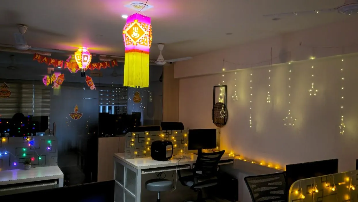 The TeqStars office at night with a hanging lantern and fairy lights for Diwali