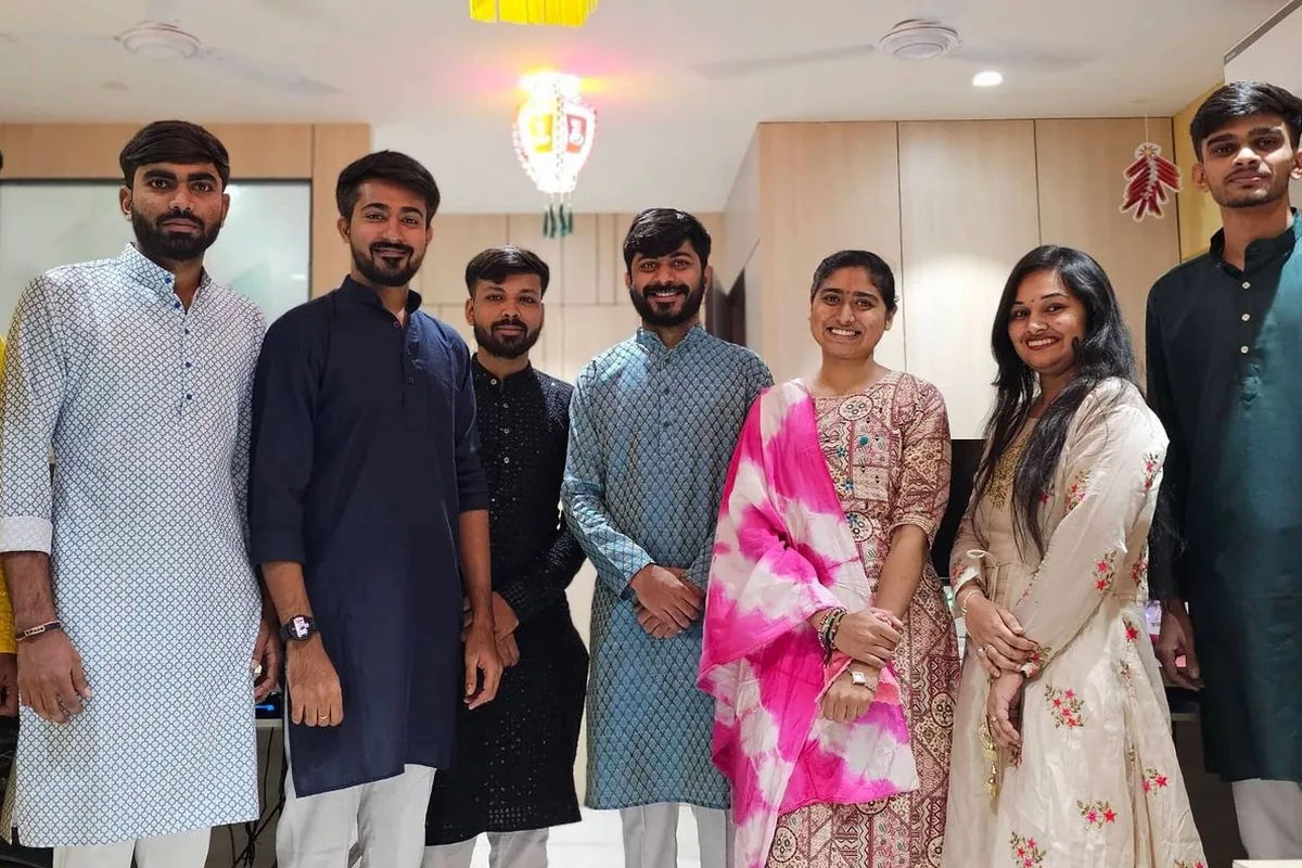 The TeqStars team in traditional dress at the office