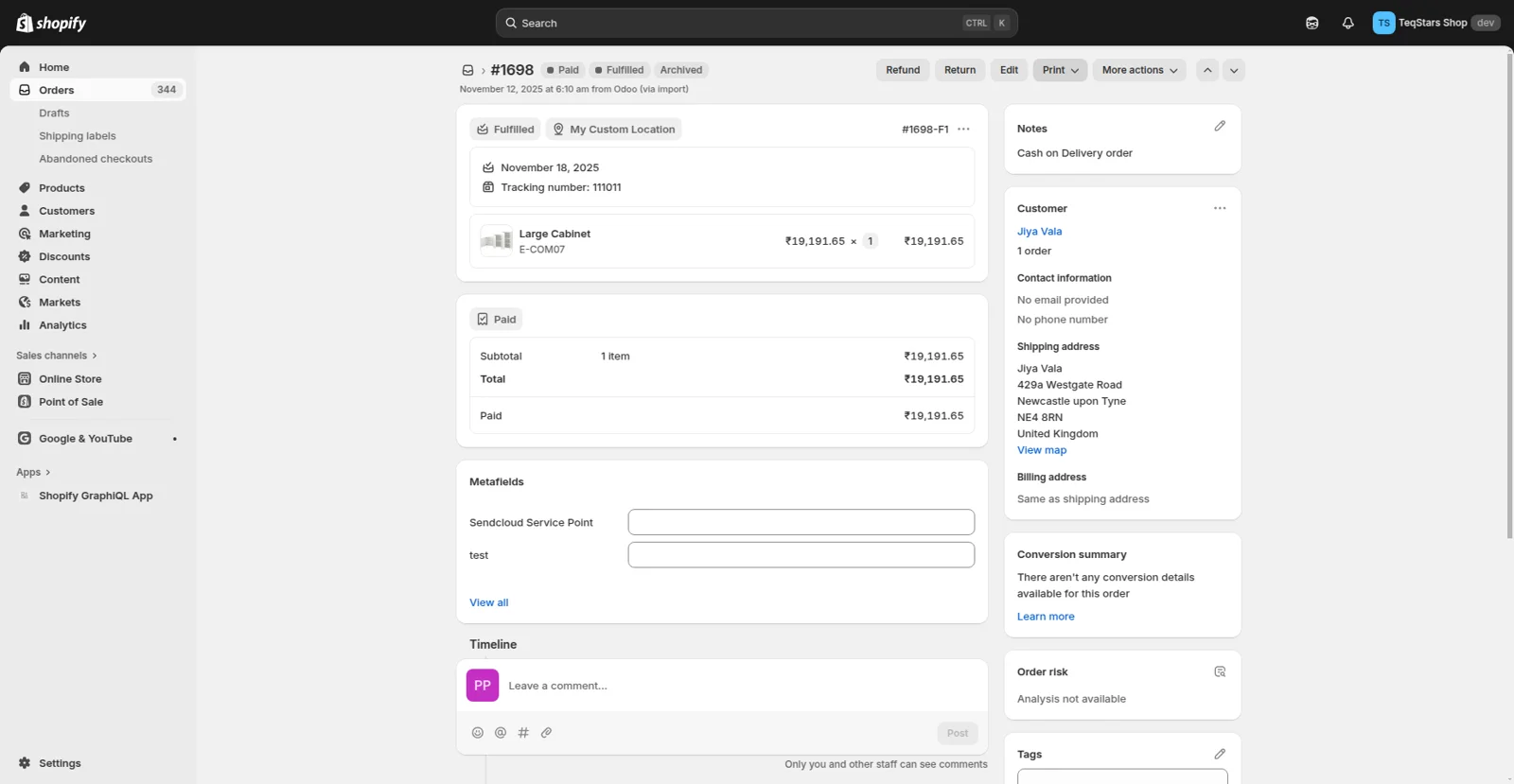 Shopify order showing fulfilled status and the tracking number exported from Odoo